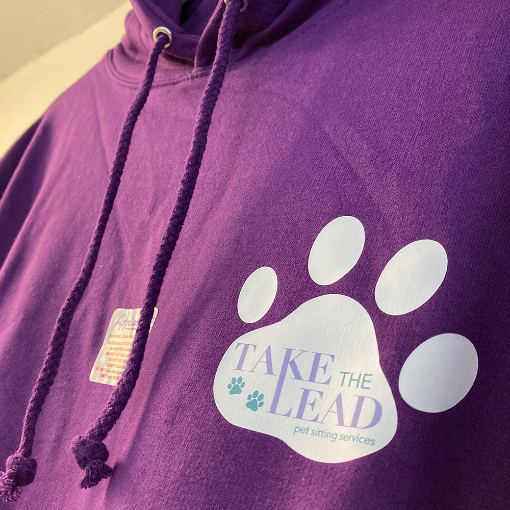Heat-Applied logos to hoodies for Take the Lead.