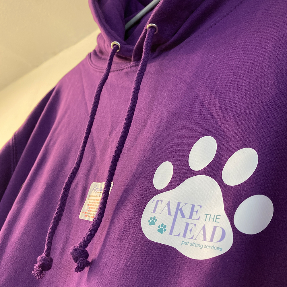 Heat Applied logo onto Hoodies for Take the Lead pet sitting