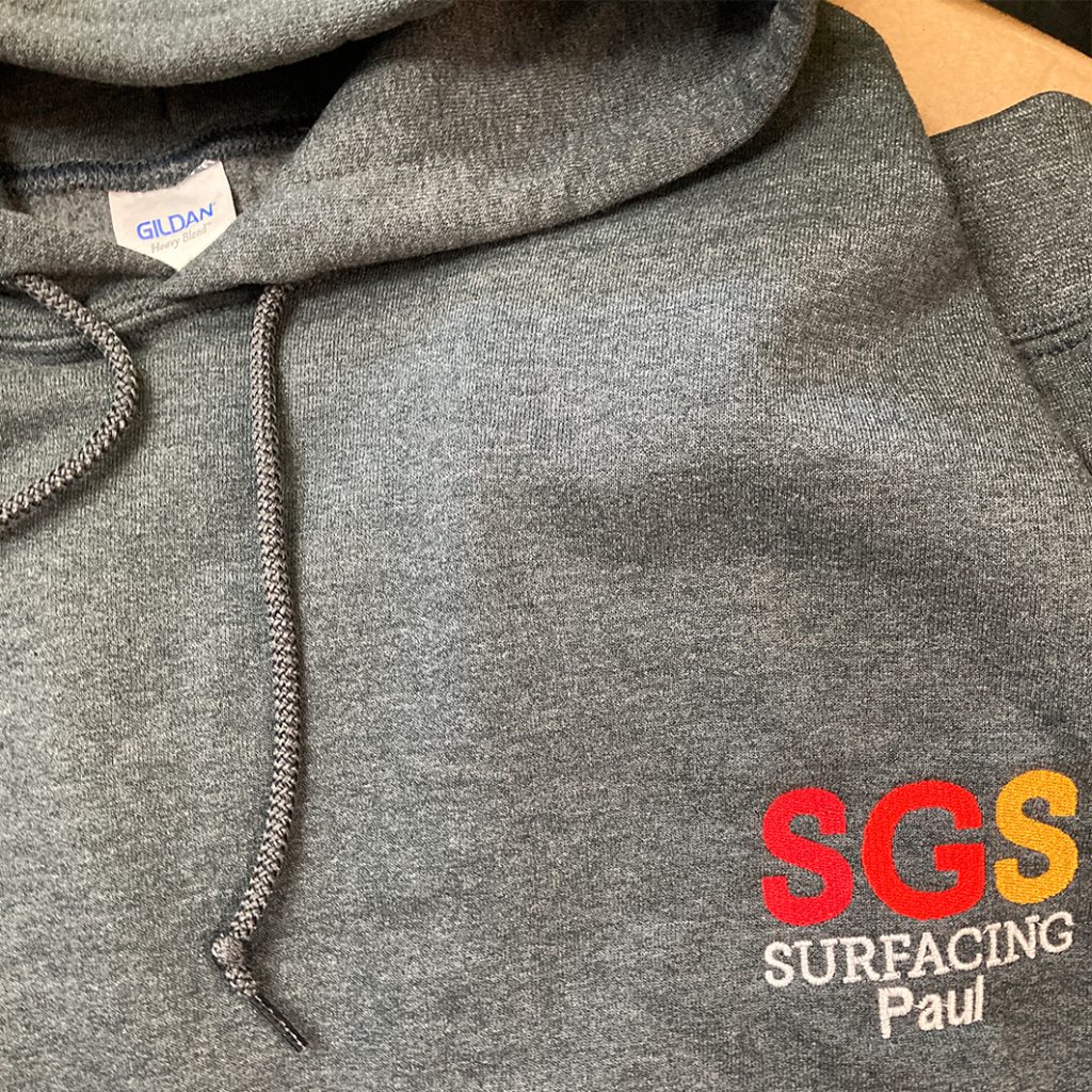 Embroidered hoodie for local SGS Surfacing with customied names for staff